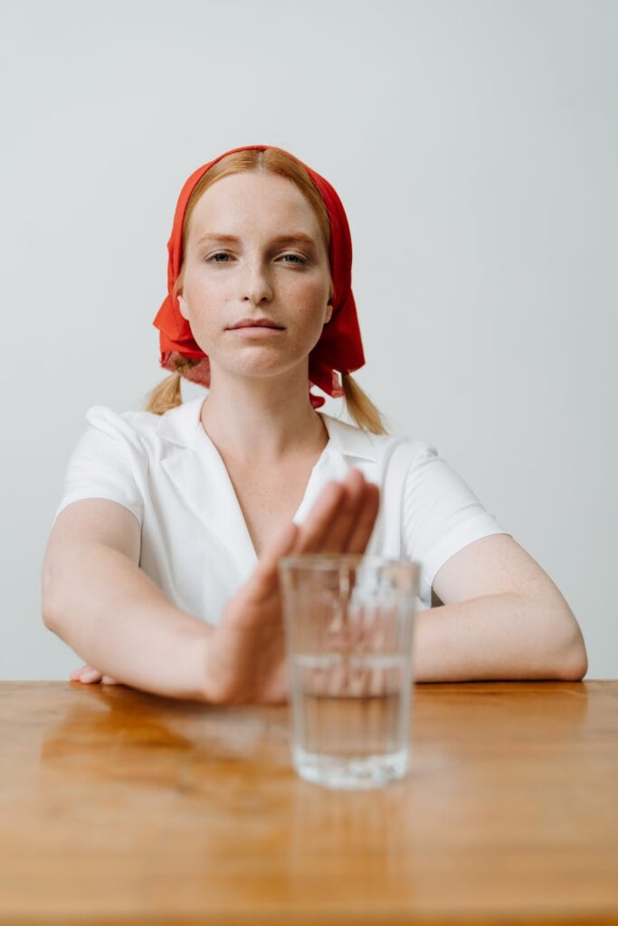 pcos weight loss - woman in white button up shirt wearing red bandana